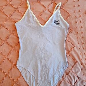 Victoria’s Secret PINK bodysuit “good vibes” in lavender and white